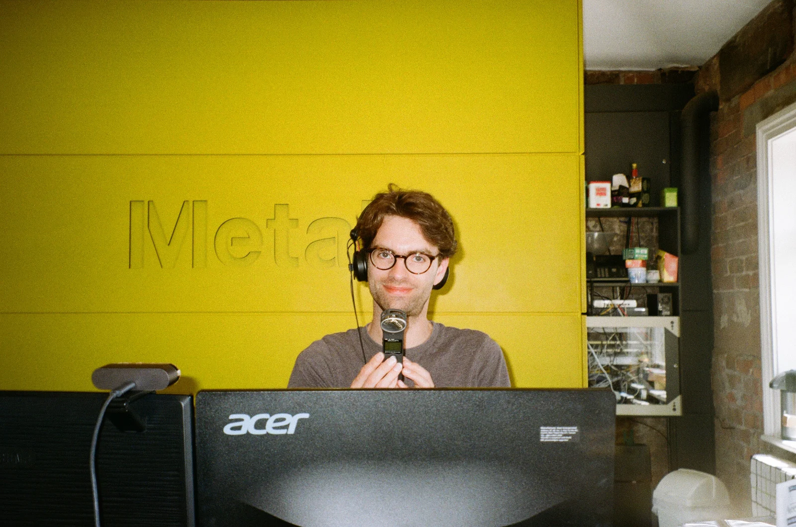 GM at Metal office desk co JD